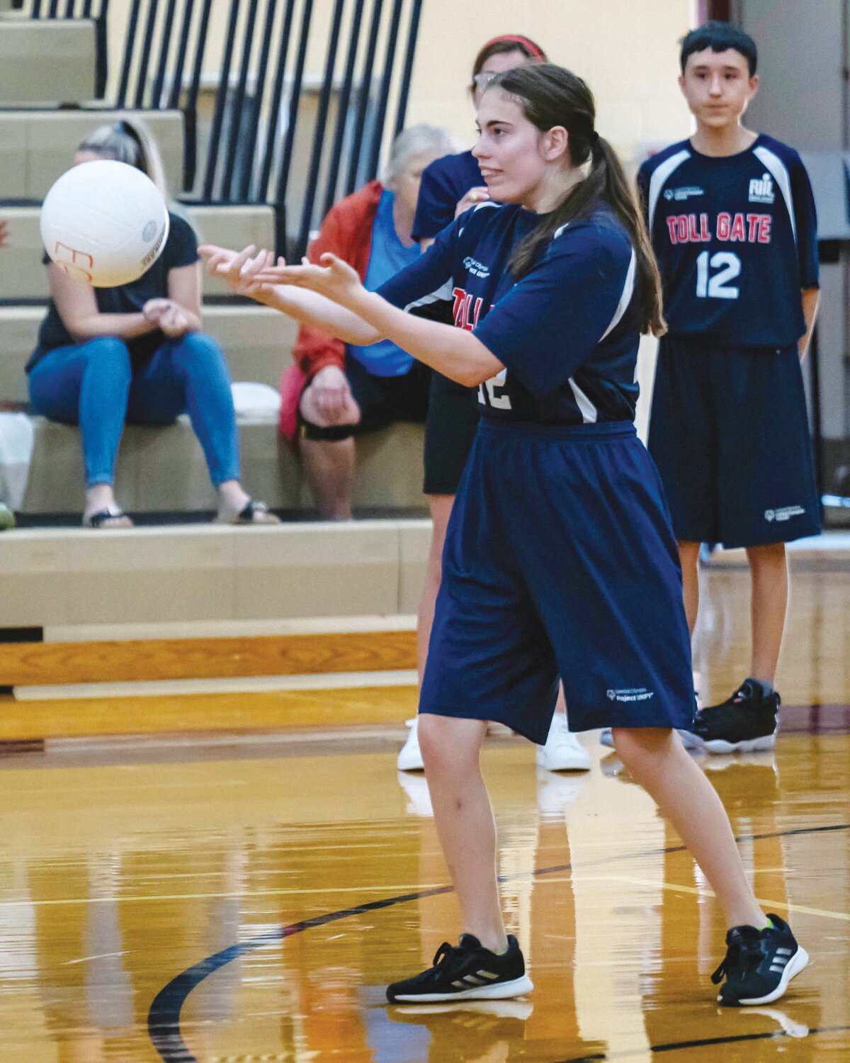 EYE ON THE BALL: Daphne Cardillo tracks the ball.